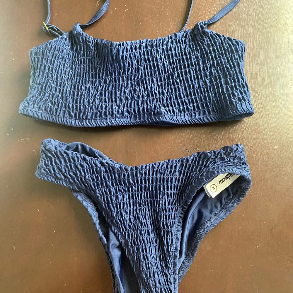 Blue swim suit.